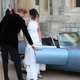 Prince Harry, duke of Sussex, and his new bride, the duchess of Sussex, leave Windsor Castle after their wedding to attend an evening reception at Frogmore House, hosted by the prince of Wales, on May 19, 2018, in Windsor, England.